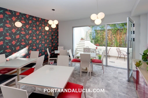 Comfortable breakfast room with sun terrace