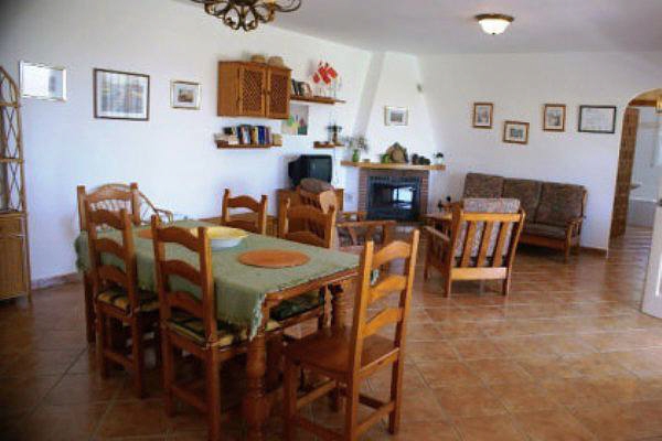 Living- dining area with fireplace