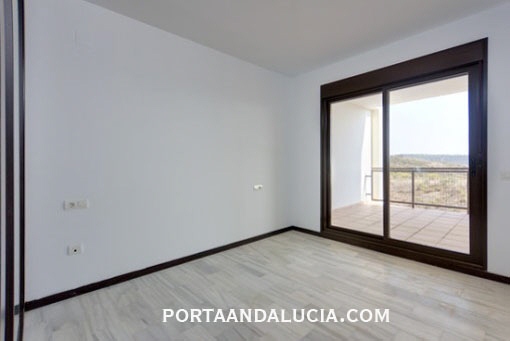 One of the bedrooms with access to the terrace