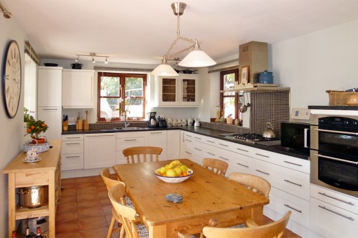 Modern kitchen with dining area