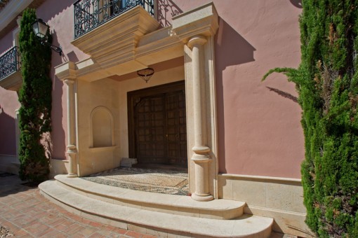 Main entrance with wooden door