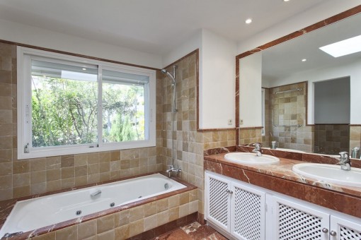 Bright bathroom with bathtub