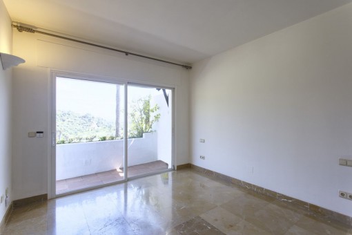 Master bedroom with access to the balcony