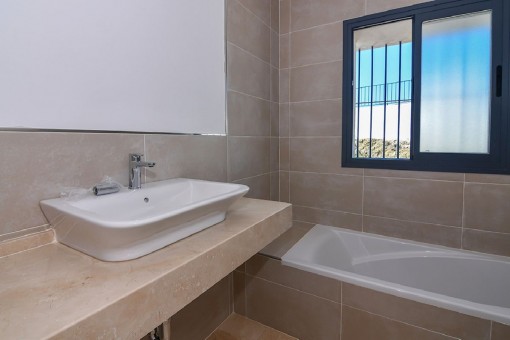 One of 3 bathrooms