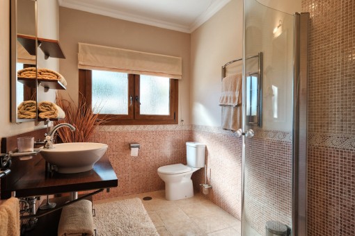 One of 3 bathrooms