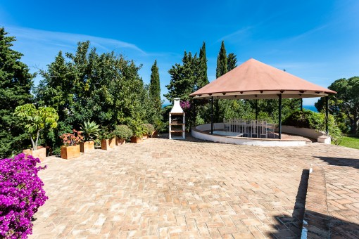 Spacious outdoor area with pavilion and sea views