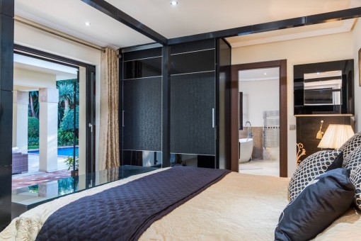 Master bedroom with en suite bathroom and access to the terrace