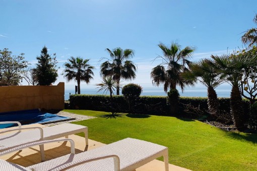 Sunny garden and pool area